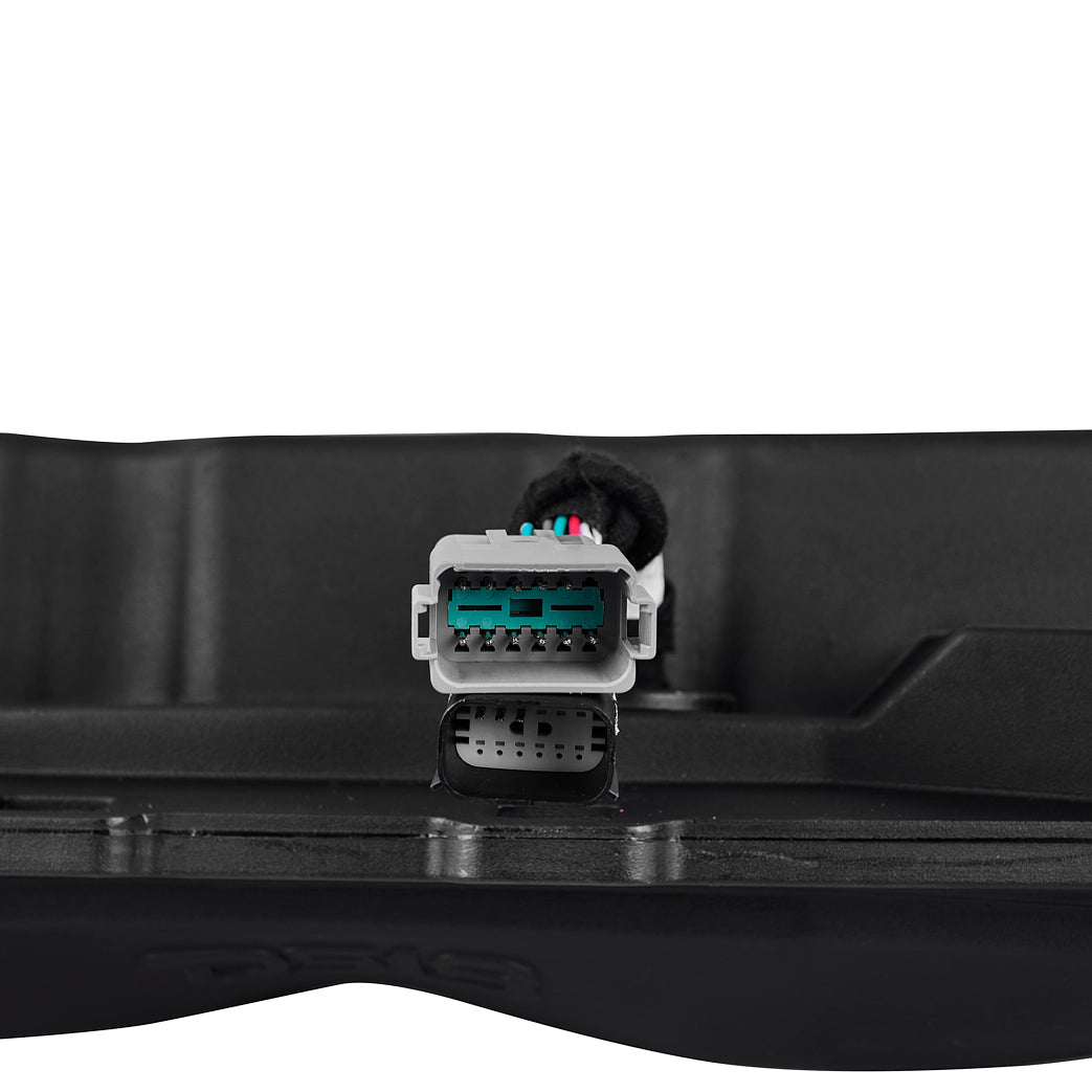 Close-up of the DS18 JL24-SBAR/BK plug-and-play harness connector mounted on the enclosure